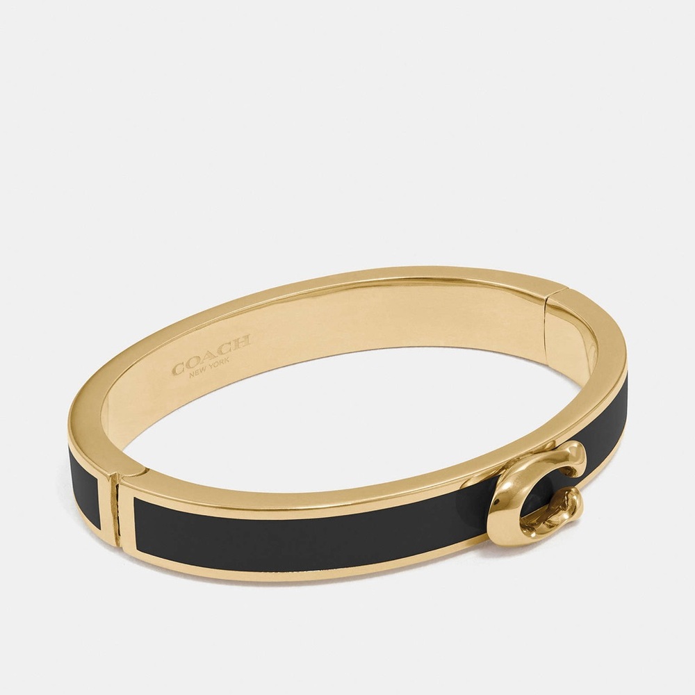 - Coach Black and Gold Signature Push Hinged Bangle
